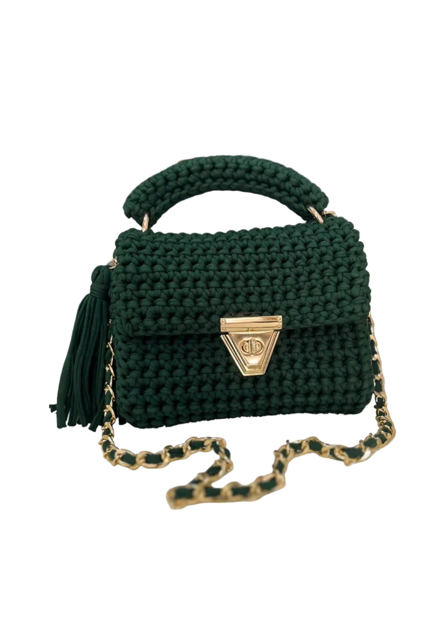 Green woven handbag with gold chain and clasp on a white surface.