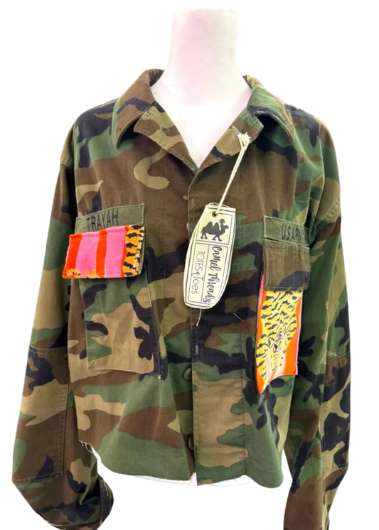 Camouflage jacket with a pink Leopard patch