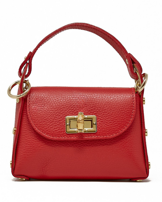 Red handbag with gold accents on a white background