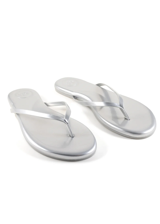 Pair of silver flip-flops on a white background