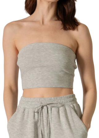 A gray modal fabric tube top, worn by a female model.