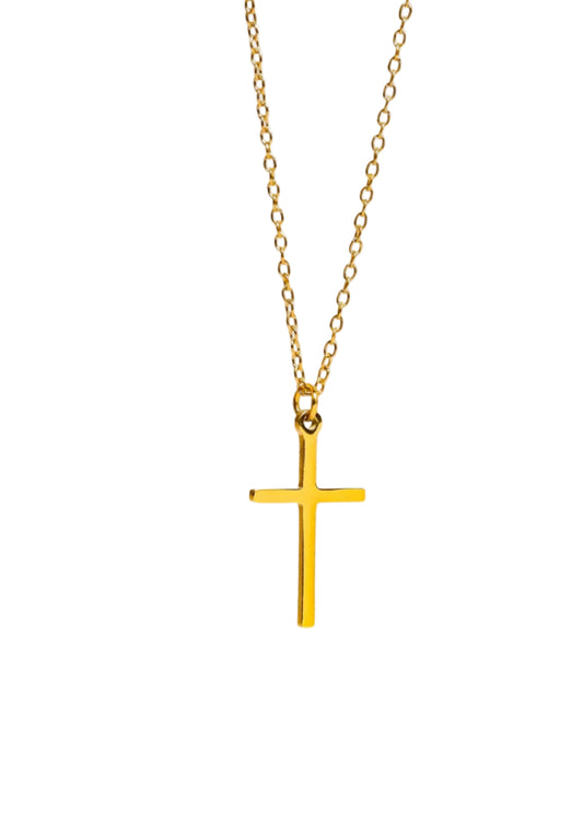 Gold cross necklace on a white background