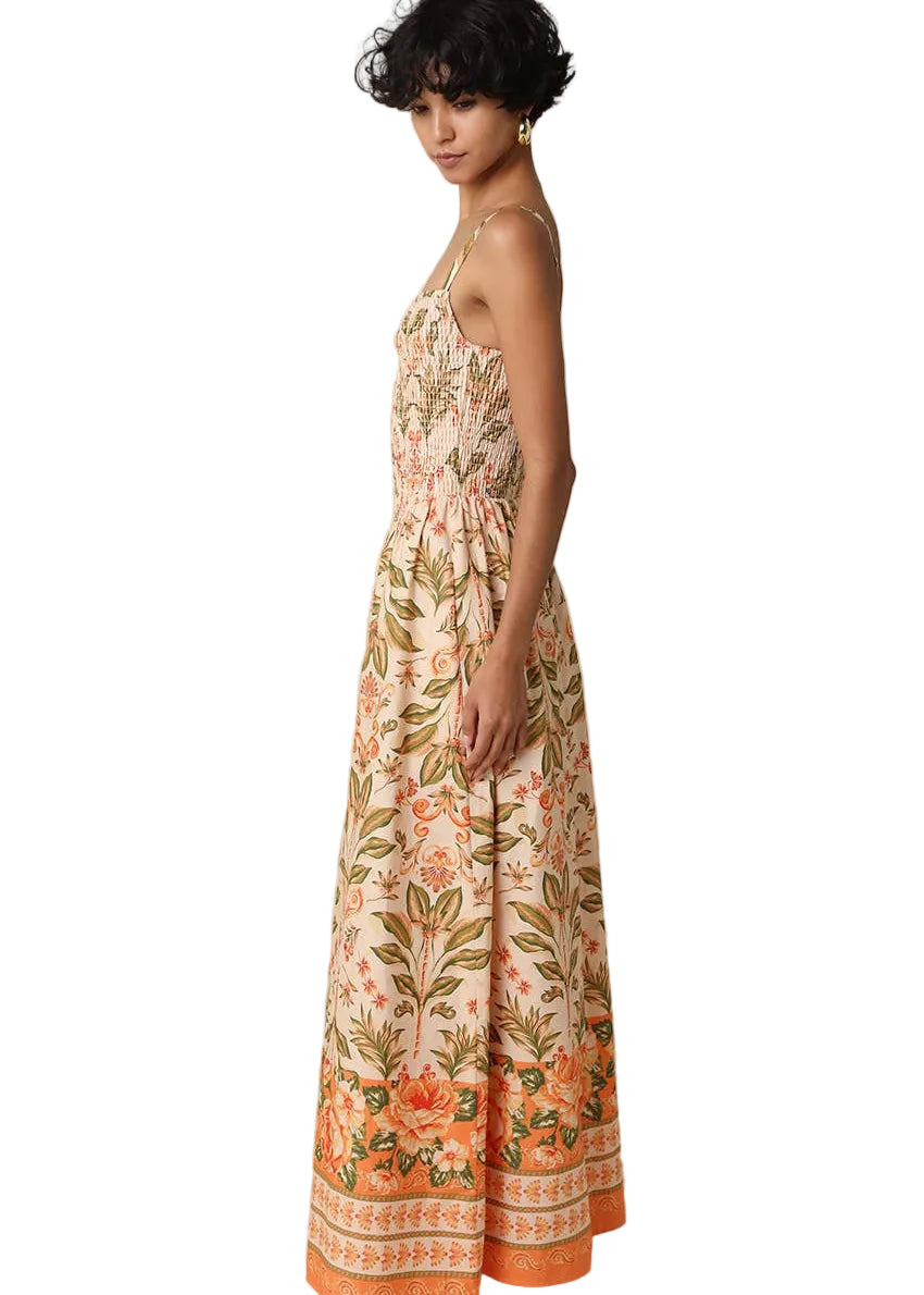 Woman wearing a floral dress on a beige background