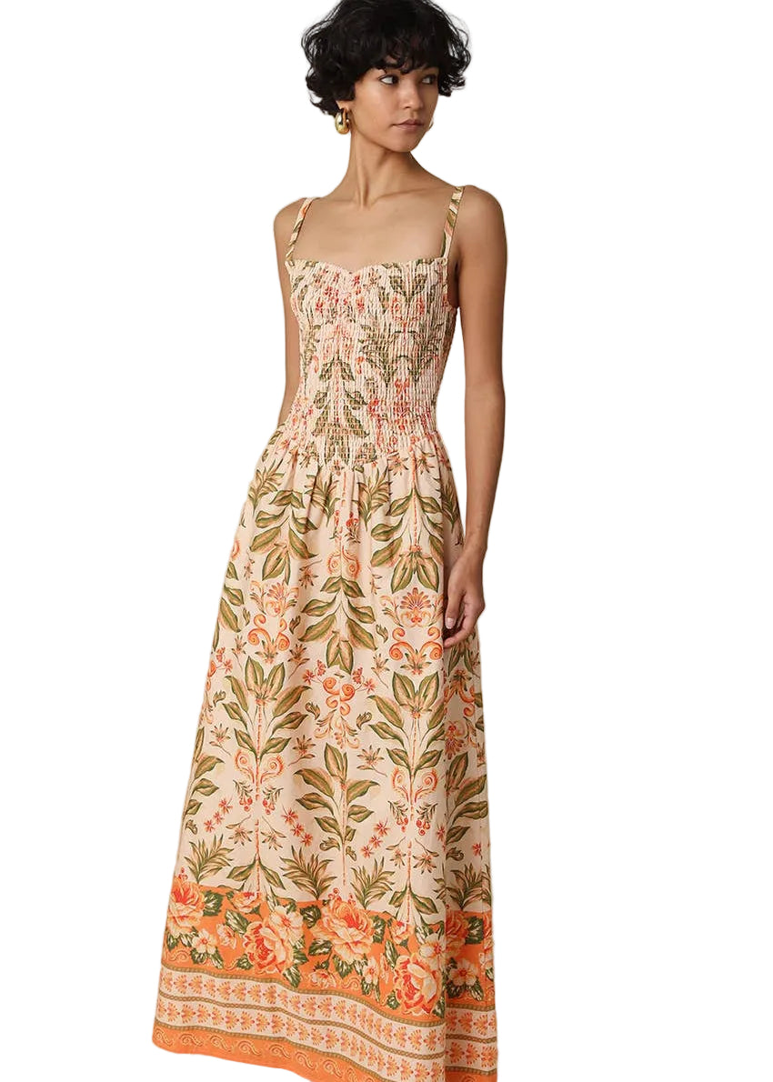 Woman wearing a floral dress with a beige background