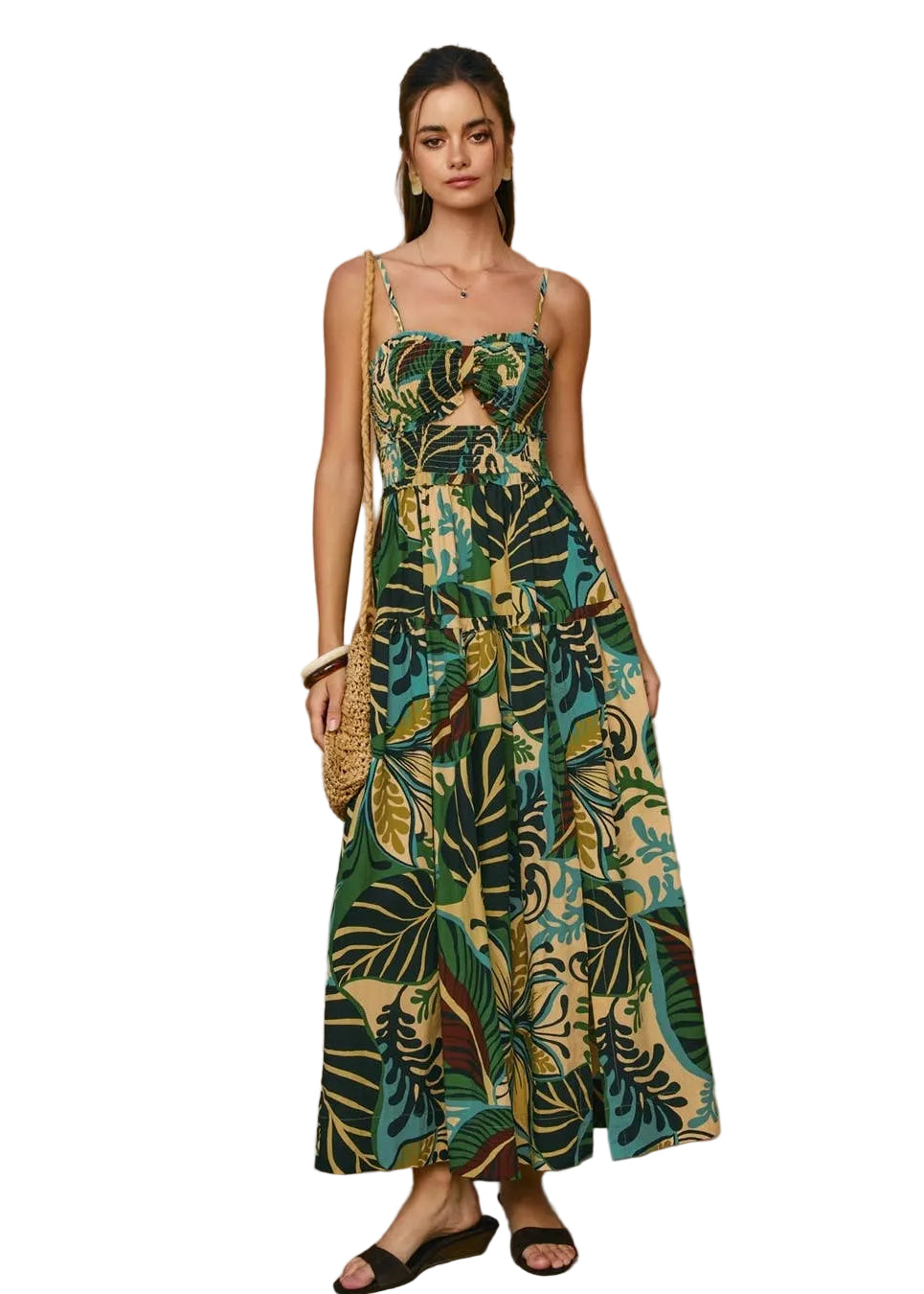 Woman wearing a tropical patterned dress on a white background