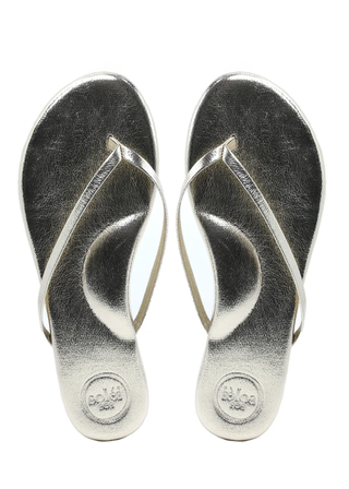 Pair of silver flip-flops on a white background