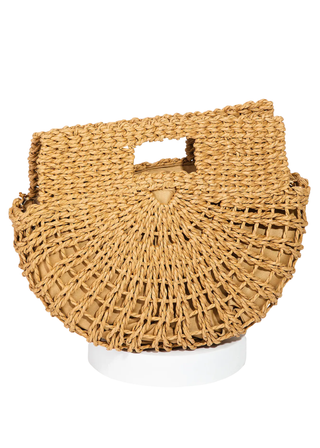 Woven straw handbag on a white background