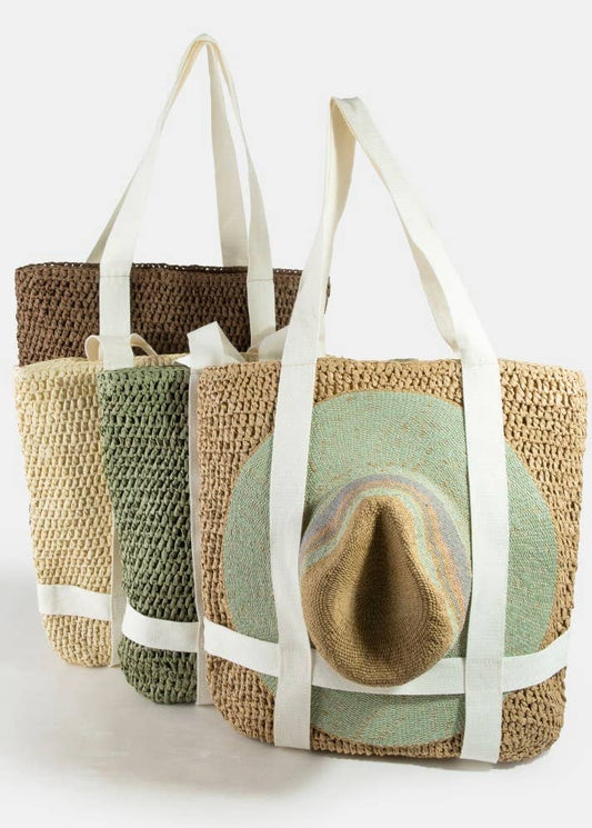 Set of three woven bags with white straps on a white background