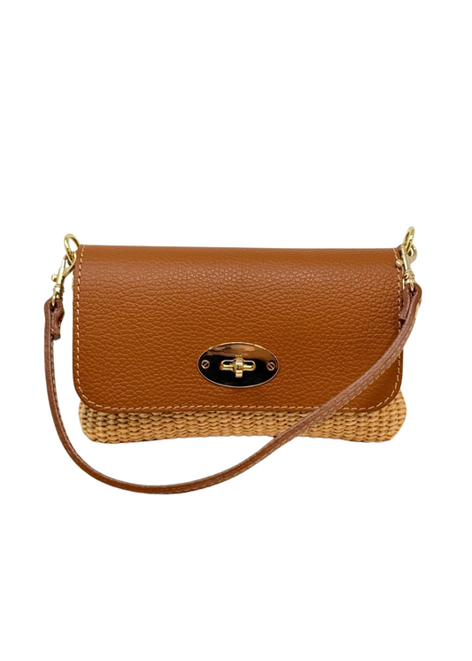 Brown handbag with a woven design on a white background