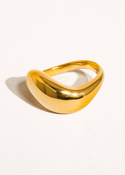 Gold ring on a white background